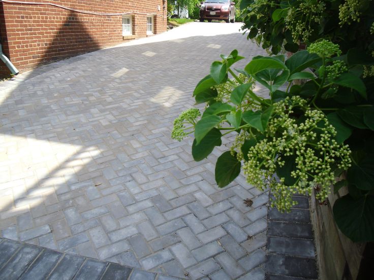Classic paver driveway. Traditional herringbone pattern with a .