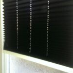 Intu pleated blind fitted beading of pvc door. No drill holes .