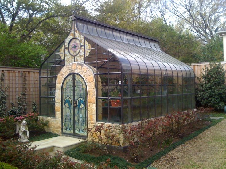 steampunktendencies: “ Greenhouse with stained glass doors .