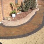 Brick Paver Walkway with Charcoal Border/ Stone Edging .