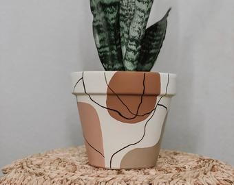 Hand painted pots | Etsy | Painted pots diy, Painted plant pots .