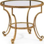 round hand-wrought iron two tier table with distressed antique .