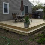 ground level deck with step surround | Decks backyard, Deck .
