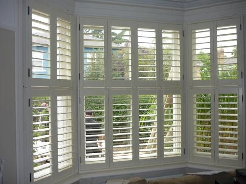 Wooden shutters | Bay window curtains living room, Bay window .