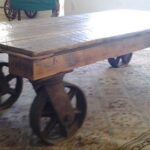 Coffee Table With Iron Industrial Wheels | Industrial coffee table .