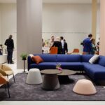 Artifort / Milano 2018 Poppin blue sofa and terracotta pillows .