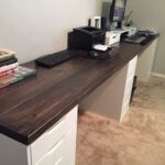10 ft long wood office desk. I used 2x8x10 pine wood and ikea .