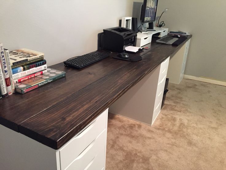 10 ft long wood office desk. I used 2x8x10 pine wood and ikea .