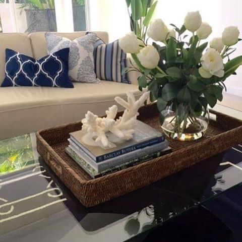 Simple styling on the coffee table. Nothing more needed .