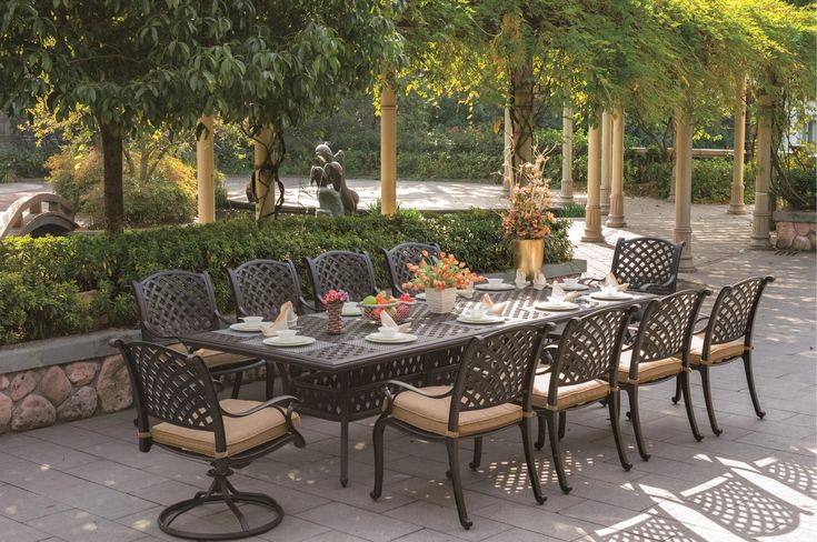 Frazee 11-Piece Patio Dining Set with Cushions and 46 x 120 .