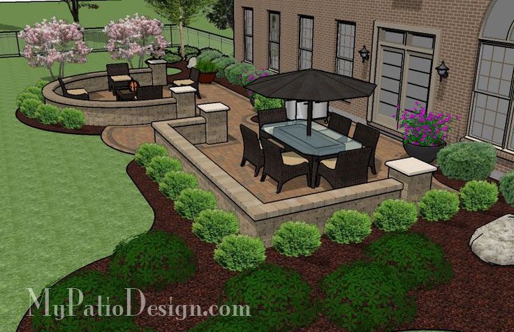 705 sq. ft. - Beautiful Backyard Patio Design with Seat Wall .