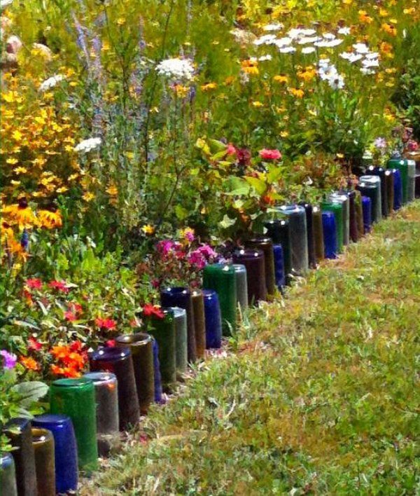 Recycled Glass Bottles | Bottle garden, Garden edging, Wine bottle .