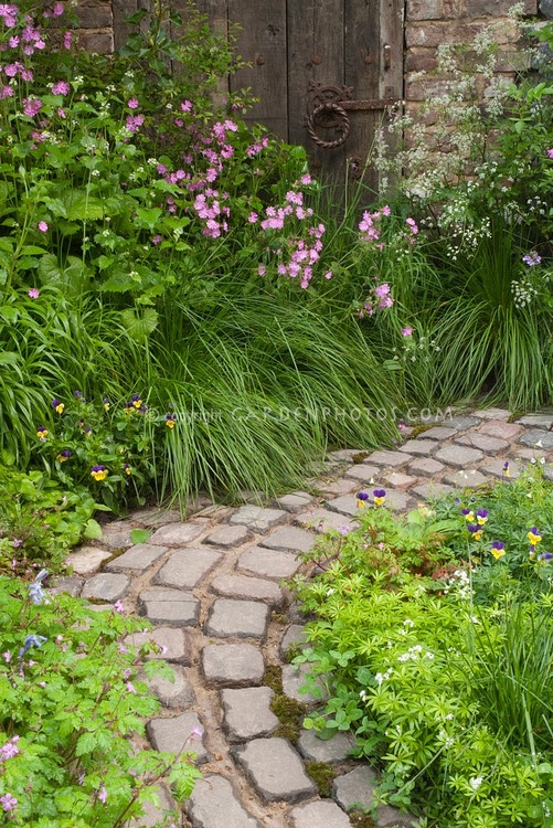 Stone pathway | Plant & Flower Stock Photography: GardenPhotos.com .