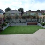 small-garden-design-travertine-paving-artificial-easi-grass-fake .