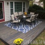 DIY deck over a concrete patio, and tips for staining your deck .