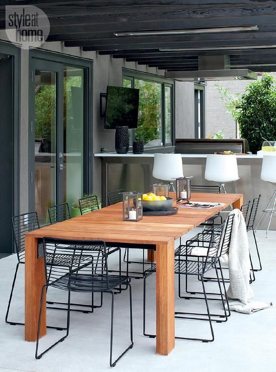 Teak Outdoor Dining Table with Black Metal Dining Chairs Under .